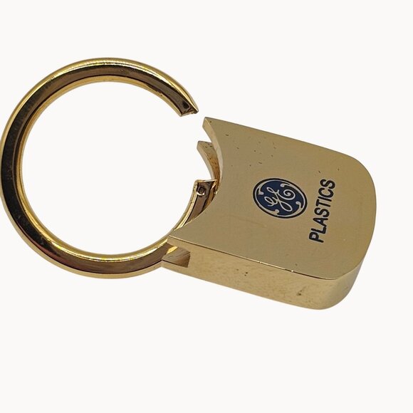 General Electric Plastics / Barlow Gold-Toned Locking Key Chain Accessory Holder - Picture 10 of 15